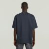A-linjeformad vävd mix-t-shirt med boxig passform
