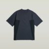 A-linjeformad vävd mix-t-shirt med boxig passform