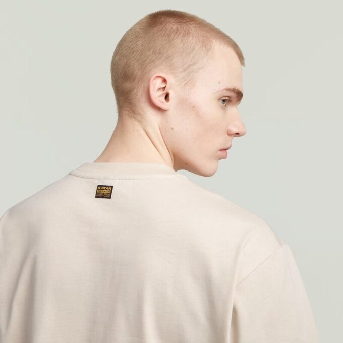 A-linjeformad vävd mix-t-shirt med boxig passform