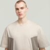 A-linjeformad vävd mix-t-shirt med boxig passform