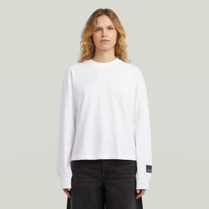 Avslappnad t-shirt med grafisk rygg Avslappnad t-shirt med grafisk rygg
