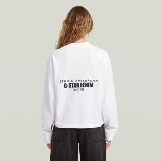 Avslappnad t-shirt med grafisk rygg