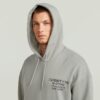 Hoodie med grafisk baksida Hoodie med grafisk baksida