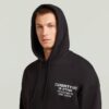 Hoodie med grafisk baksida Hoodie med grafisk baksida