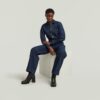 Lös jumpsuit med skärp i 3D Lös jumpsuit med skärp i 3D