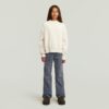 Modern kabelstickad kofta för flickor Modern kabelstickad kofta för flickor