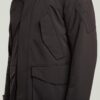 Parkas med flera fickor och vadderad jacka Parkas med flera fickor och vadderad jacka