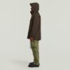 Parkas med flera fickor och vadderad jacka Parkas med flera fickor och vadderad jacka
