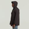 Parkas med flera fickor och vadderad jacka Parkas med flera fickor och vadderad jacka