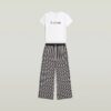 Pyjamasset med t-shirt och vida byxor Pyjamasset med t-shirt och vida byxor