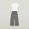Pyjamasset med t-shirt och vida byxor Pyjamasset med t-shirt och vida byxor