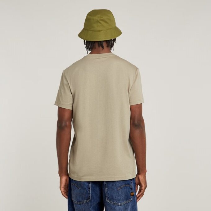 Skuggvävd t-shirt med fickor och kamouflagemönster