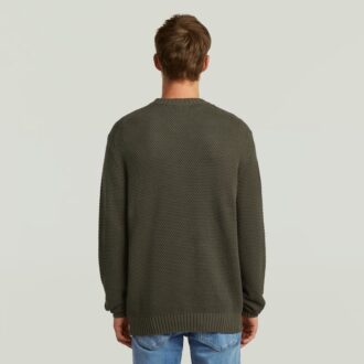 Stickad med honungskamstruktur