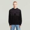 Stickad pullover i vävd blandning Stickad pullover i vävd blandning