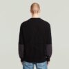 Stickad pullover i vävd blandning Stickad pullover i vävd blandning