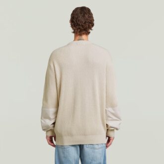 Stickad pullover i vävd blandning