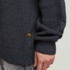 Stickad pullover i vävd blandning Stickad pullover i vävd blandning