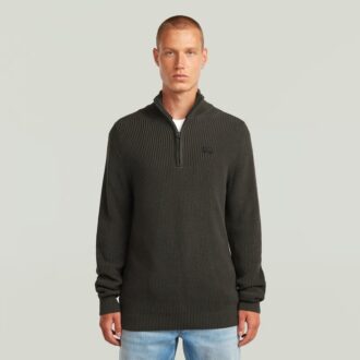 Stickad pullover med halv dragkedja