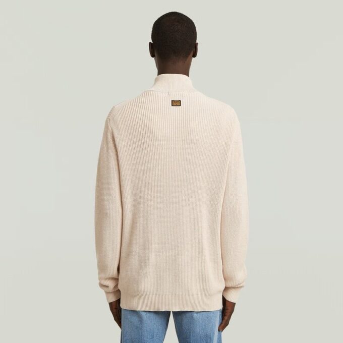 Stickad pullover med halv dragkedja Stickad pullover med halv dragkedja