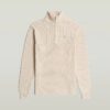 Stickad pullover med halv dragkedja Stickad pullover med halv dragkedja