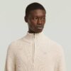 Stickad pullover med halv dragkedja Stickad pullover med halv dragkedja
