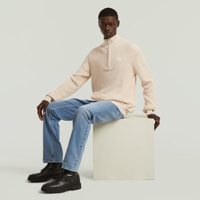 Stickad pullover med halv dragkedja Stickad pullover med halv dragkedja
