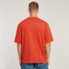 T-shirt med boxig passform och mittbröst
