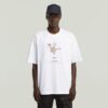 T-shirt med boxigt tryck och arkivtryck