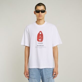 T-shirt med boxigt tryck och arkivtryck
