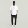 T-shirt med boxigt tryck och arkivtryck