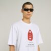 T-shirt med boxigt tryck och arkivtryck