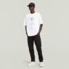 T-shirt med boxigt tryck och arkivtryck