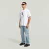 T-shirt med boxigt tryck och arkivtryck