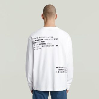 T-shirt med broderad text baktill