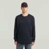 T-shirt med broderad text baktill