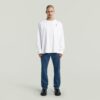 T-shirt med broderad text baktill