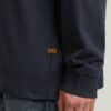 T-shirt med broderad text baktill