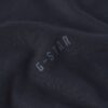 T-shirt med broderad text baktill