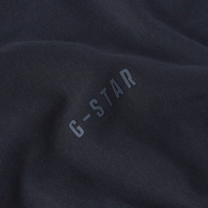 T-shirt med broderad text baktill