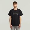 T-shirt med lappar och lös passform T-shirt med lappar och lös passform