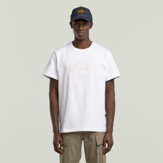 T-shirt med lappar och lös passform