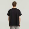 T-shirt med lappar och lös passform T-shirt med lappar och lös passform