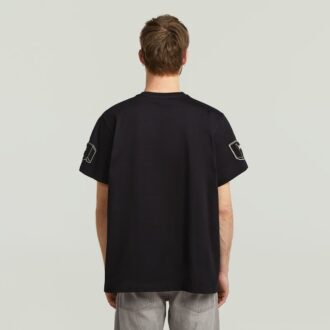 T-shirt med lappar och lös passform