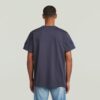 T-shirt med lappar och lös passform