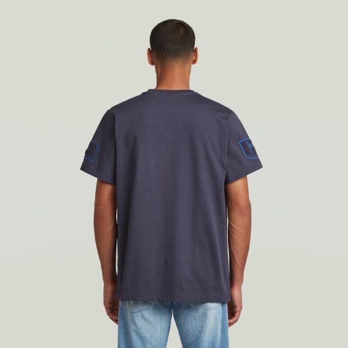 T-shirt med lappar och lös passform