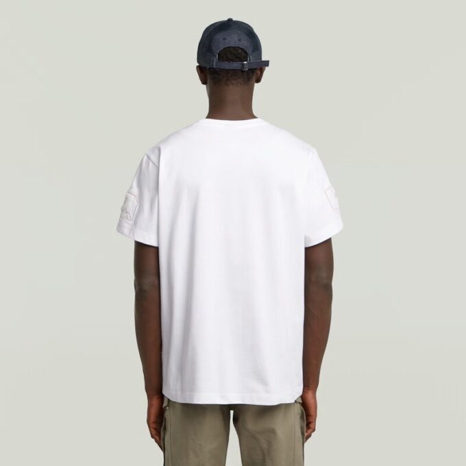 T-shirt med lappar och lös passform T-shirt med lappar och lös passform