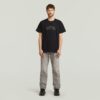 T-shirt med lappar och lös passform T-shirt med lappar och lös passform