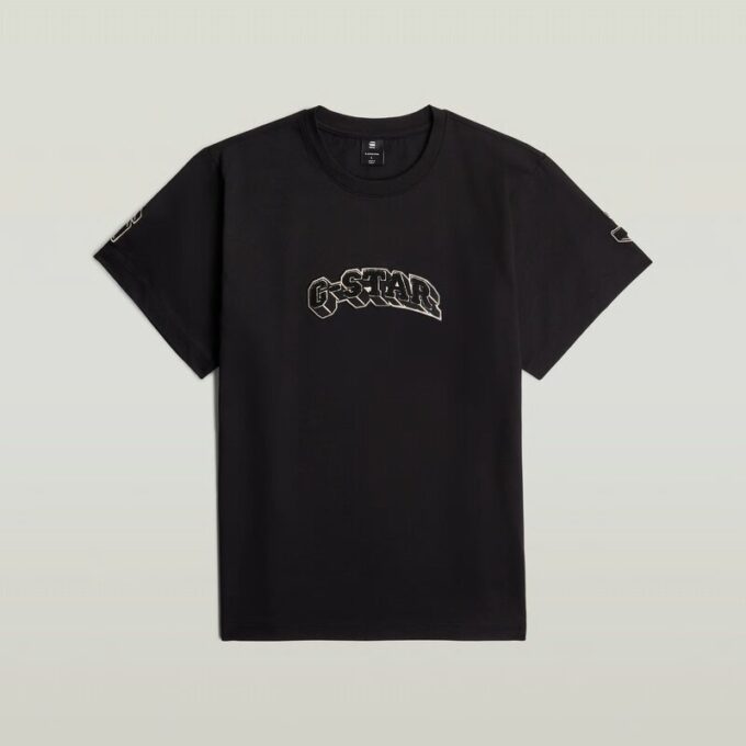 T-shirt med lappar och lös passform T-shirt med lappar och lös passform