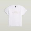 T-shirt med lappar och lös passform T-shirt med lappar och lös passform