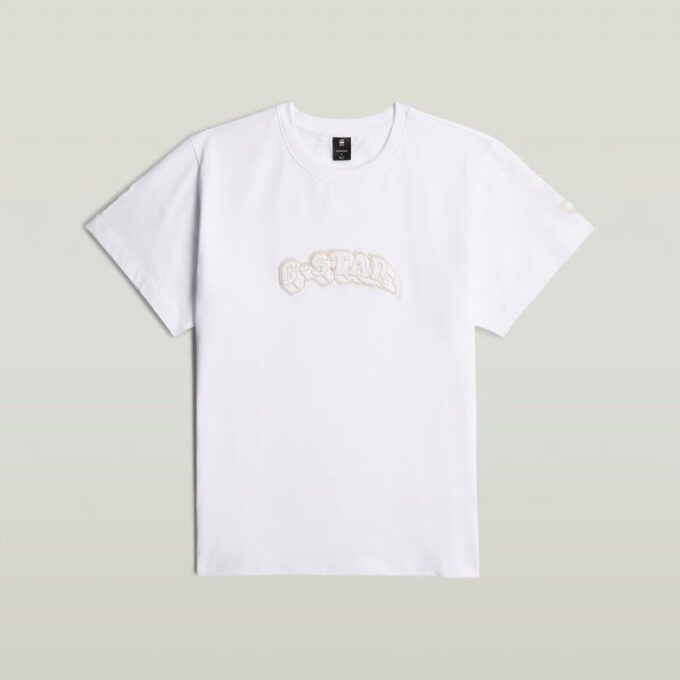 T-shirt med lappar och lös passform T-shirt med lappar och lös passform